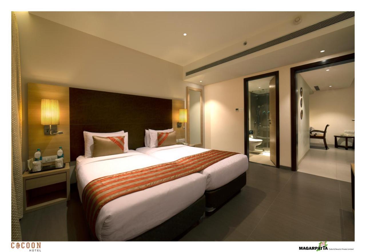 Cocoon Hotel Pune Bagian luar foto