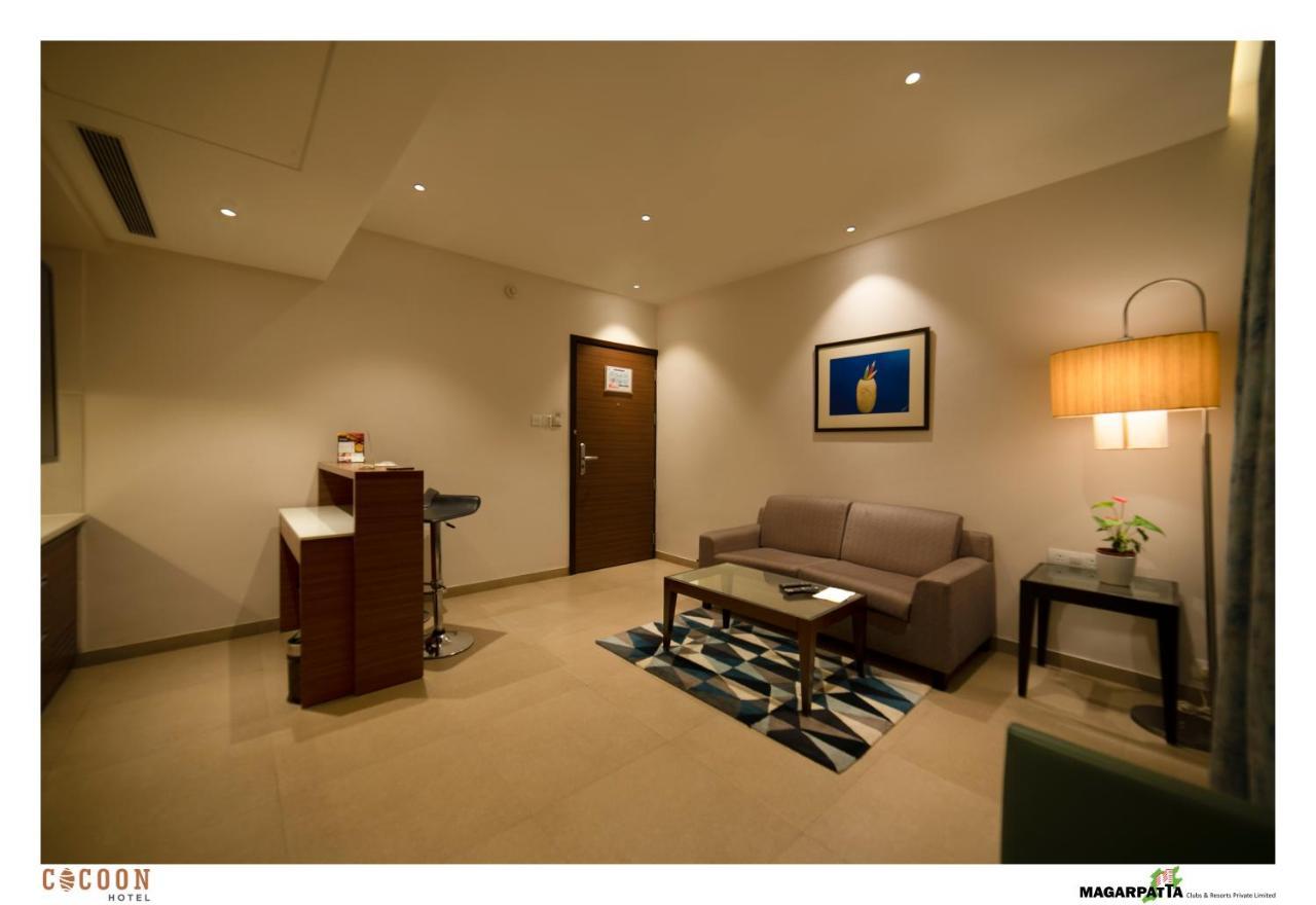 Cocoon Hotel Pune Bagian luar foto