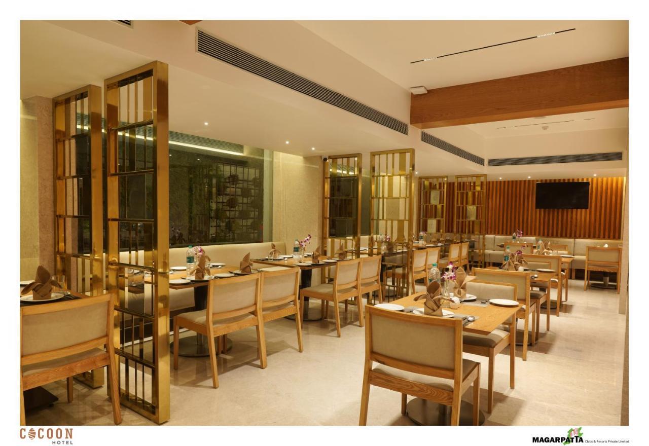 Cocoon Hotel Pune Bagian luar foto