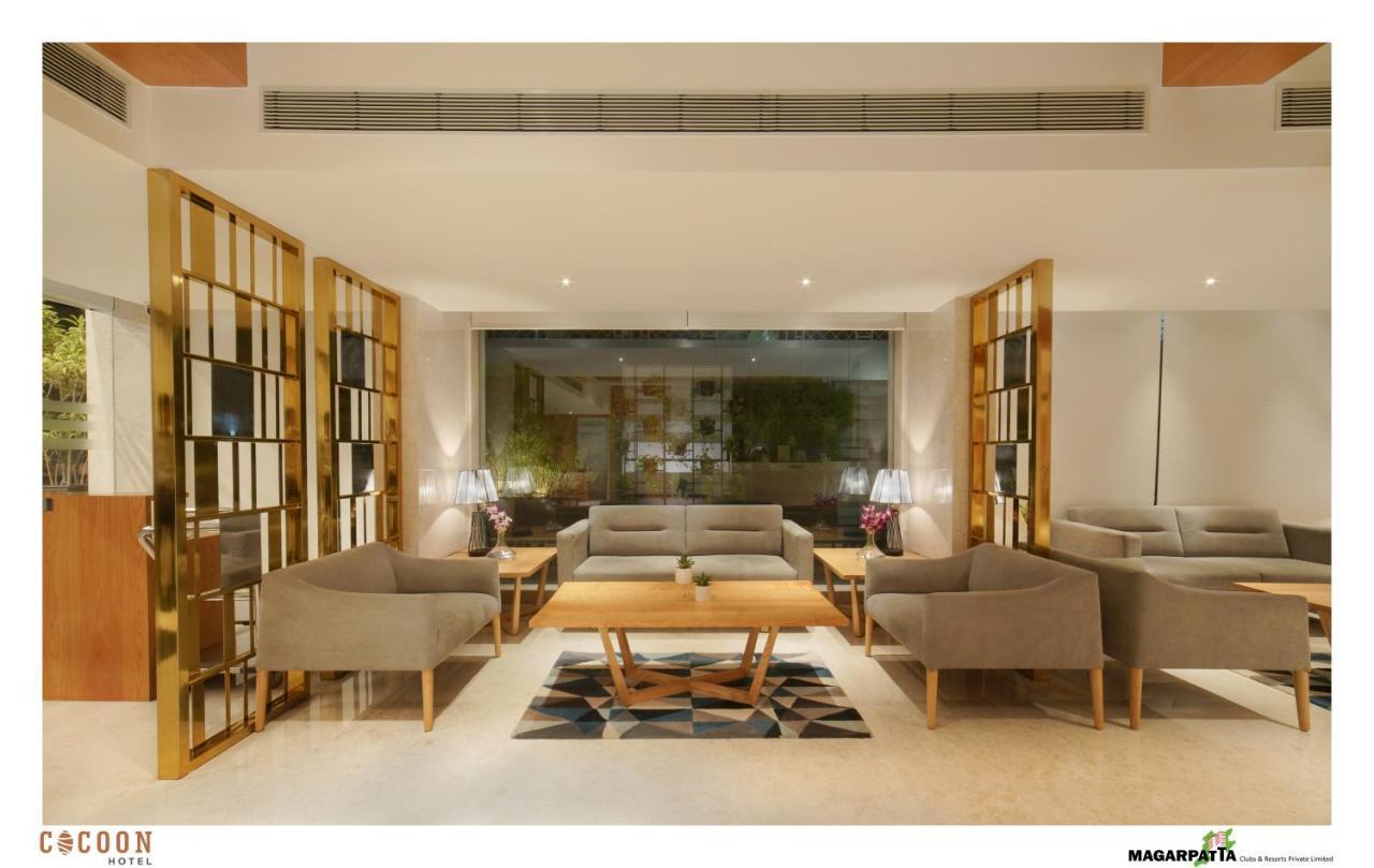 Cocoon Hotel Pune Bagian luar foto