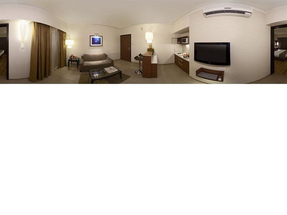 Cocoon Hotel Pune Bagian luar foto