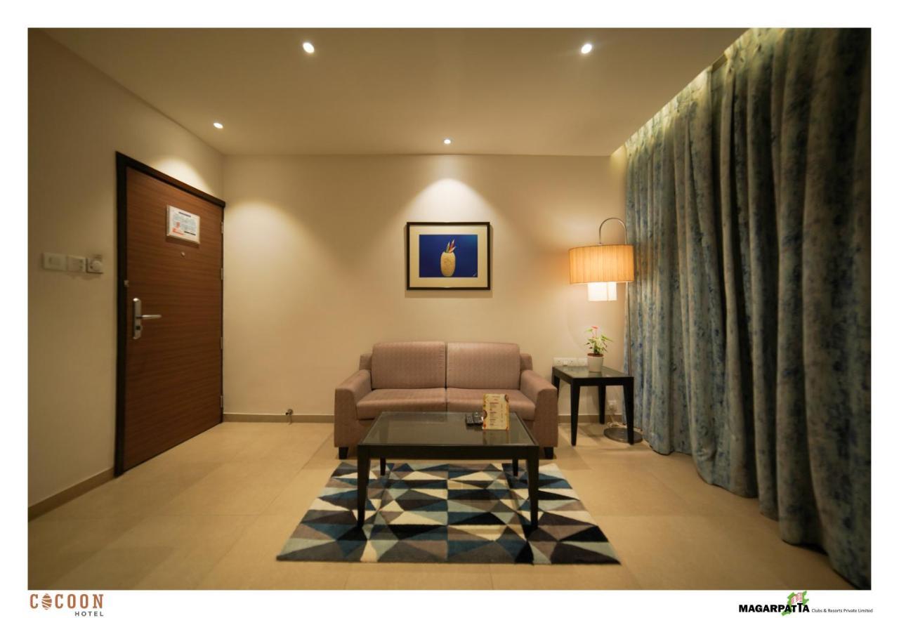 Cocoon Hotel Pune Bagian luar foto