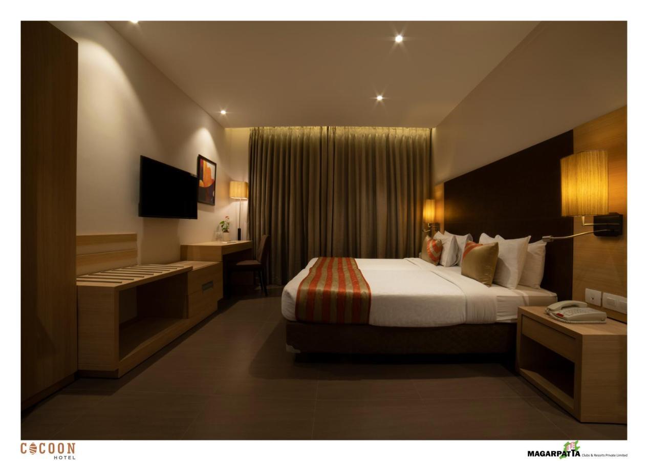 Cocoon Hotel Pune Bagian luar foto