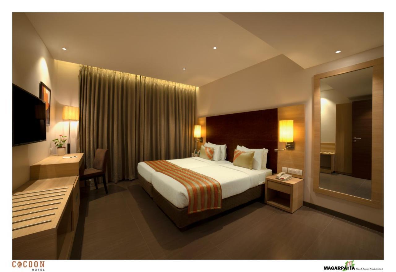 Cocoon Hotel Pune Bagian luar foto