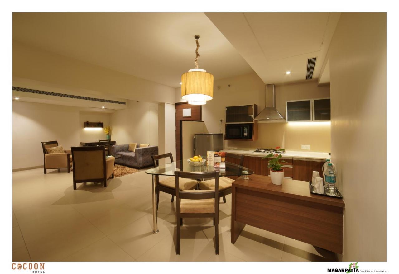 Cocoon Hotel Pune Bagian luar foto